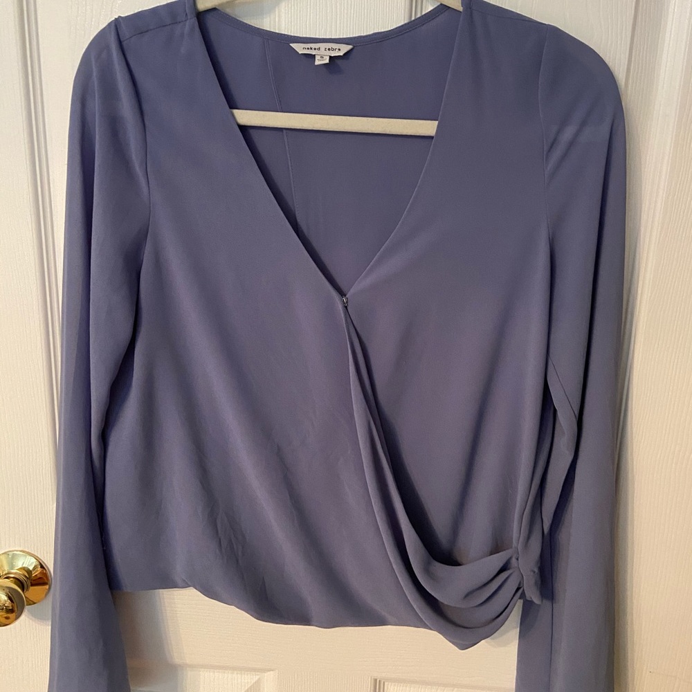 A blue V-neck blouse